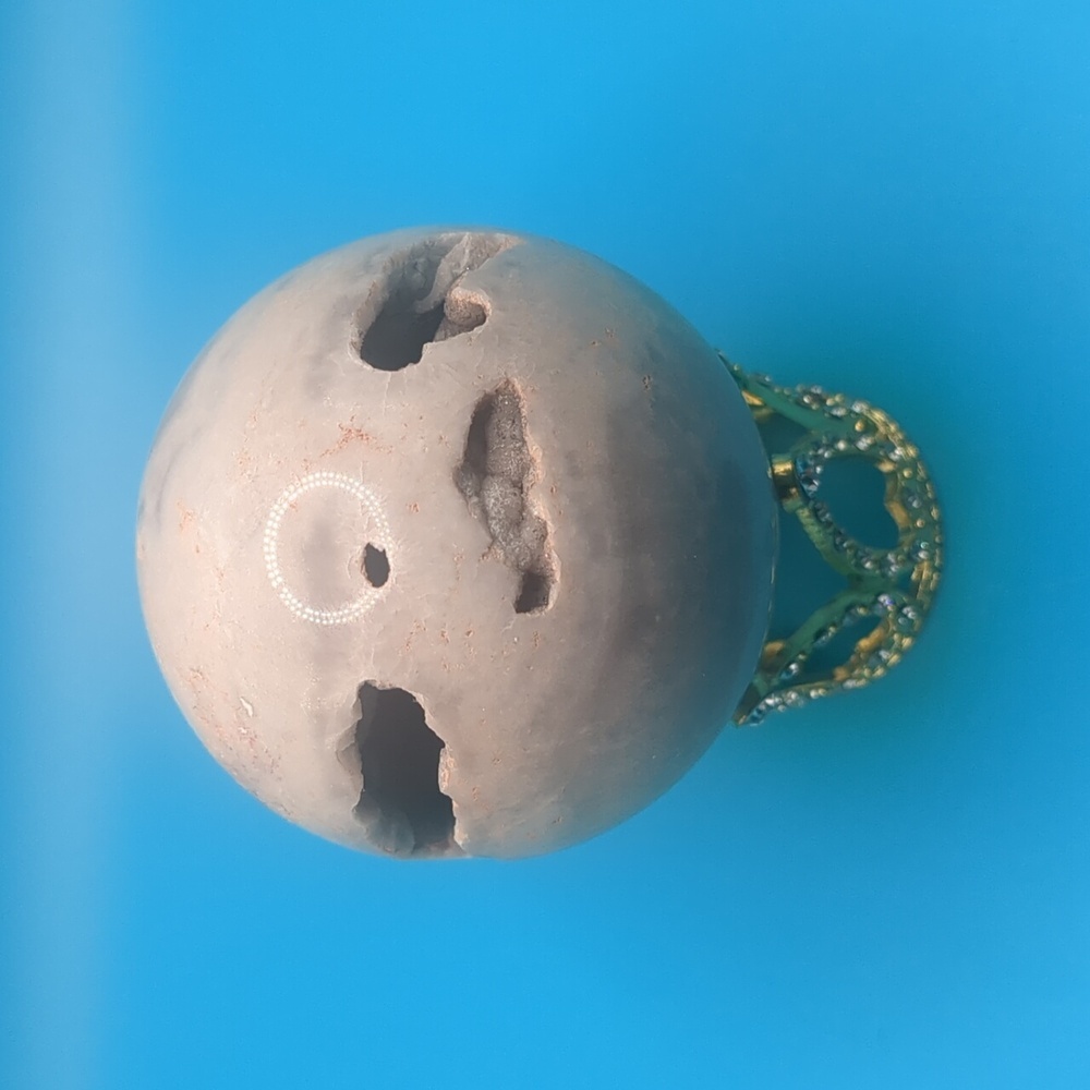 Stunning druzy filled pink amethyst sphere